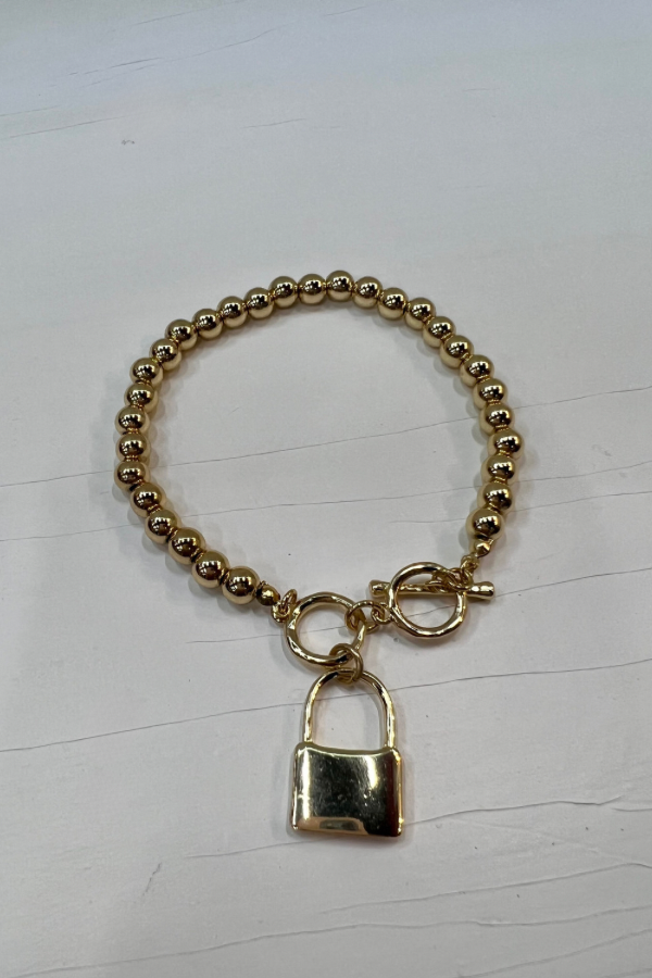 Beaded Toggle Bracelet With Lock Charm Gold
