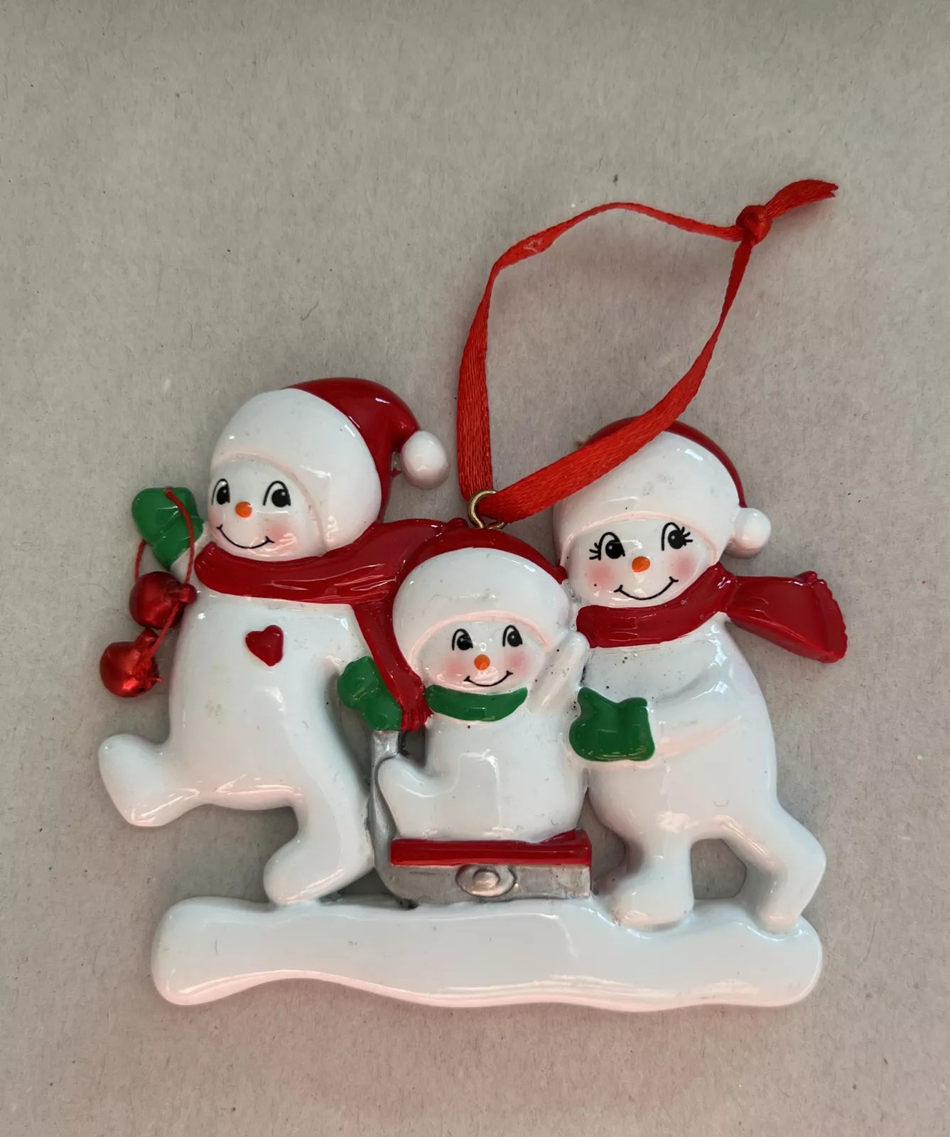 Snowmen Sled Family Of 3 Personalize Ornament